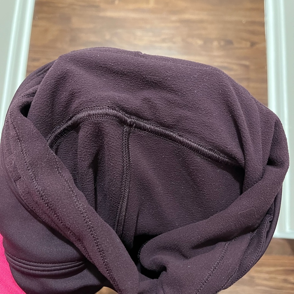 Lululemon Fast As Fleece Tight
Black Cherry Womens Size 4
Reflective Pocket - Picture 13 of 14